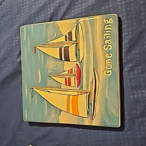 Ceramic Trivet or plaque. Measures 8"×8" has mounting or stand attached.